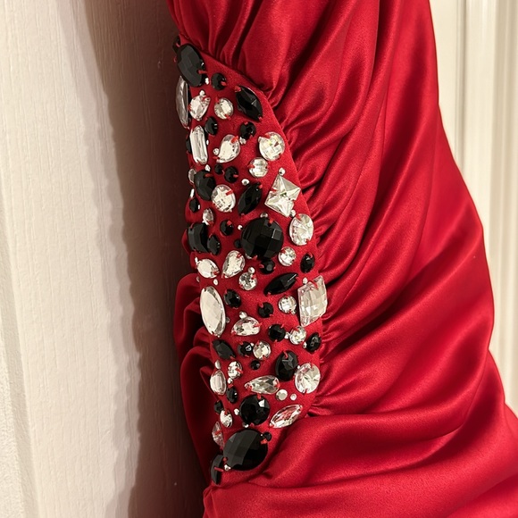 Woman’s red satin ruched evening gown with jewel detail long the side. - Picture 5 of 6